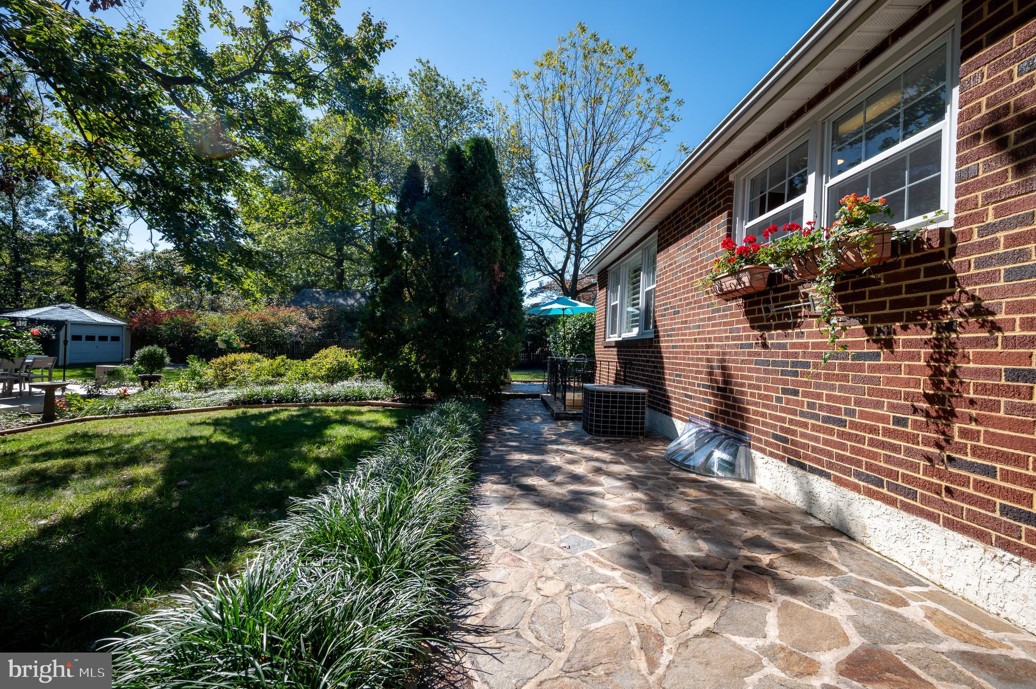 1822 Foulk Road Wilmington, DE 19810 - Photo 31 of 32 a view of backyard with plants and outdoor seating
