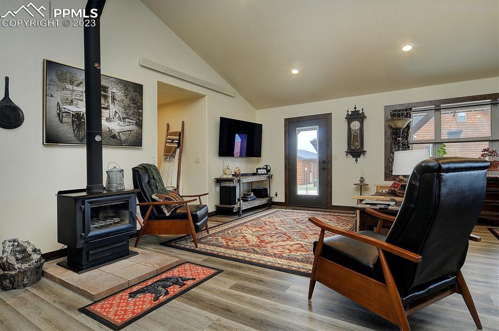 114 3rd Street Silver Cliff, CO 81252 - Photo 2 of 23 a living room with furniture fireplace and flat screen tv
