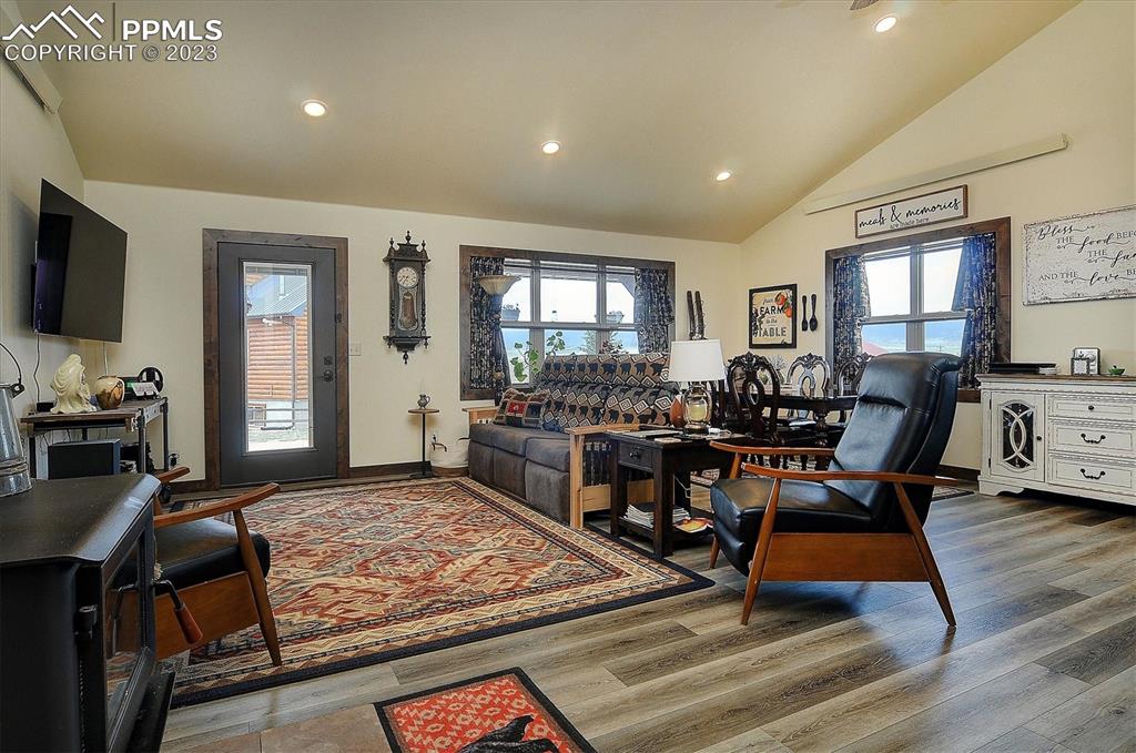 114 3rd Street Silver Cliff, CO 81252 - Photo 3 of 23 a living room with furniture a flat screen tv and windows