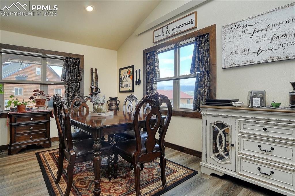 114 3rd Street Silver Cliff, CO 81252 - Photo 6 of 23 a view of a dining room with furniture and windows