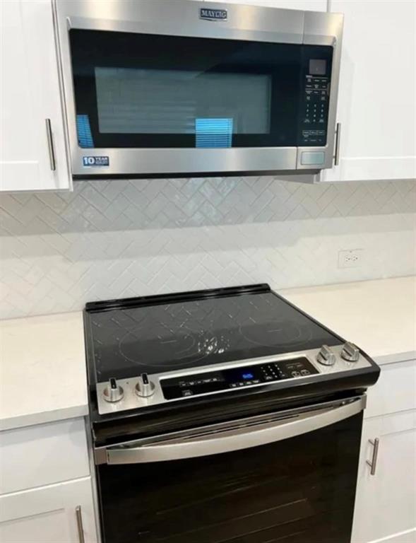 1510 Crystal Vly Way Melissa, TX 75454 - Photo 11 of 24 a stove top oven sitting inside of a kitchen