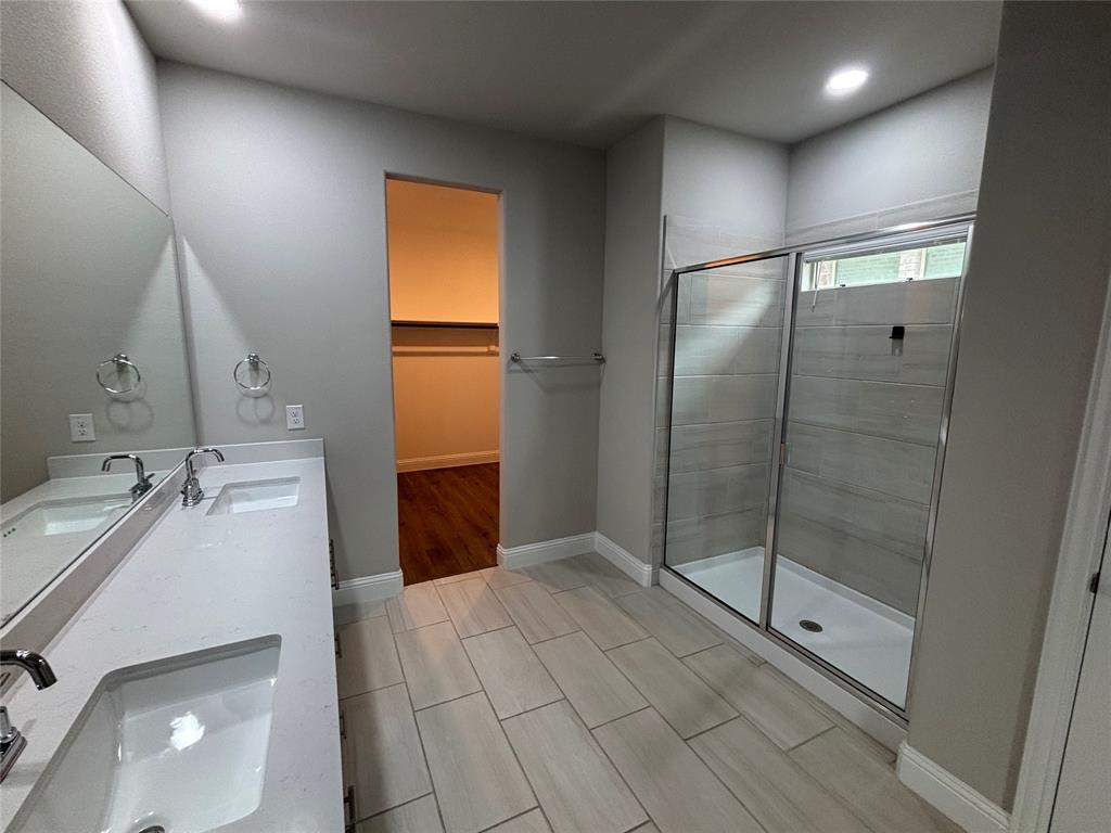 1510 Crystal Vly Way Melissa, TX 75454 - Photo 14 of 24 a bathroom with a sink a toilet and shower