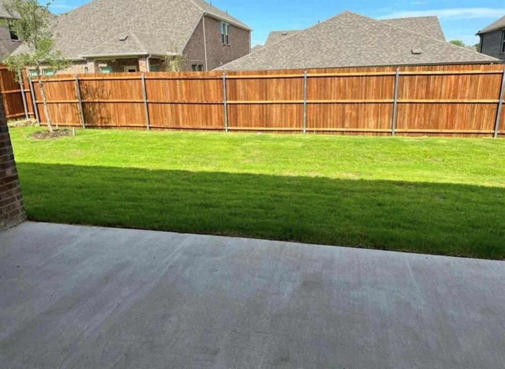 1510 Crystal Vly Way Melissa, TX 75454 - Photo 22 of 24 a backyard of a house with wooden fence