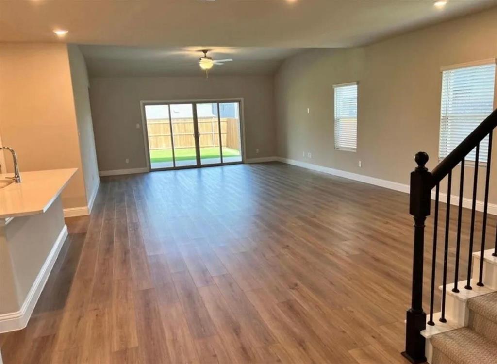 1510 Crystal Vly Way Melissa, TX 75454 - Photo 4 of 24 a view of wooden floor and windows in a room