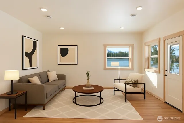 a living room with furniture and a rug