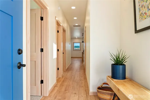 a view of entryway with wooden floor
