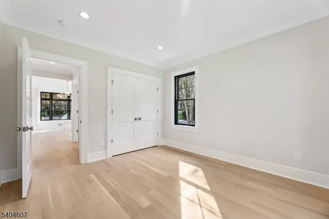 a view of livingroom with hardwood floor and hallway