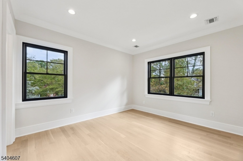 25 Beverly Road Madison, NJ 07940 - Photo 32 of 47 an empty room with windows