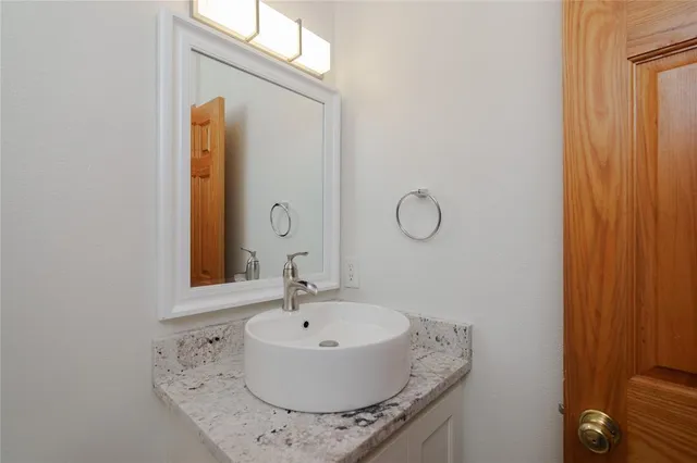 a sink with a mirror