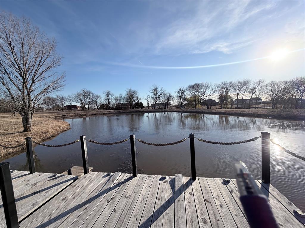 364 Parker Road Van Alstyne, TX 75495 - Photo 9 of 40 Enjoy fishing from the dock or just sitting to enjoy the view.
