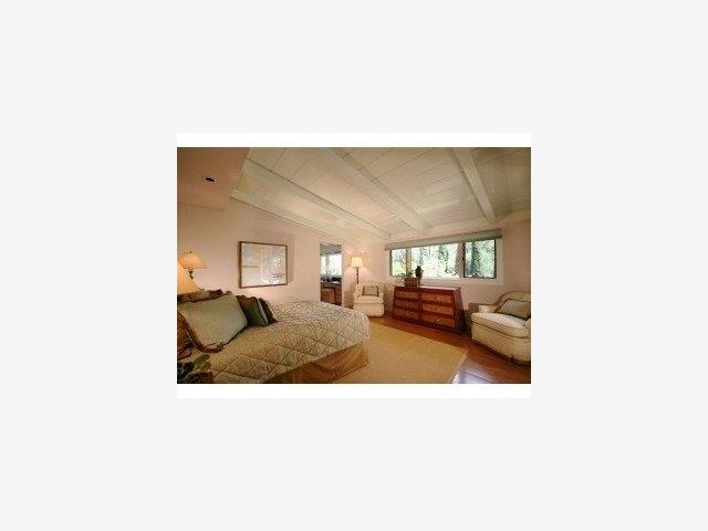 13841 Robleda Road Los Altos Hills, CA 94022 - Photo 4 of 7 a picture of a living room with a couch