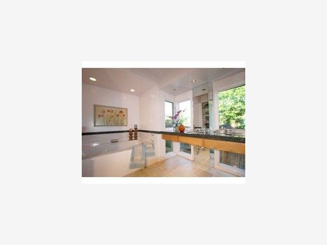 13841 Robleda Road Los Altos Hills, CA 94022 - Photo 5 of 7 a picture of a living room with a sink