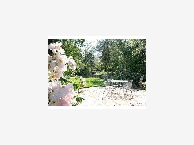 13841 Robleda Road Los Altos Hills, CA 94022 - Photo 6 of 7 a picture of a bench in a backyard