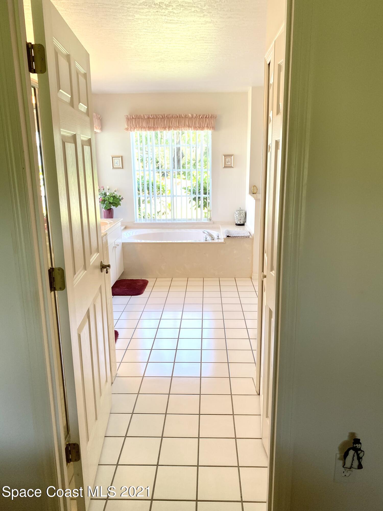 1210 Meadowbrook Road Northeast Palm Bay, FL 32905 - Photo 21 of 36 Master bath