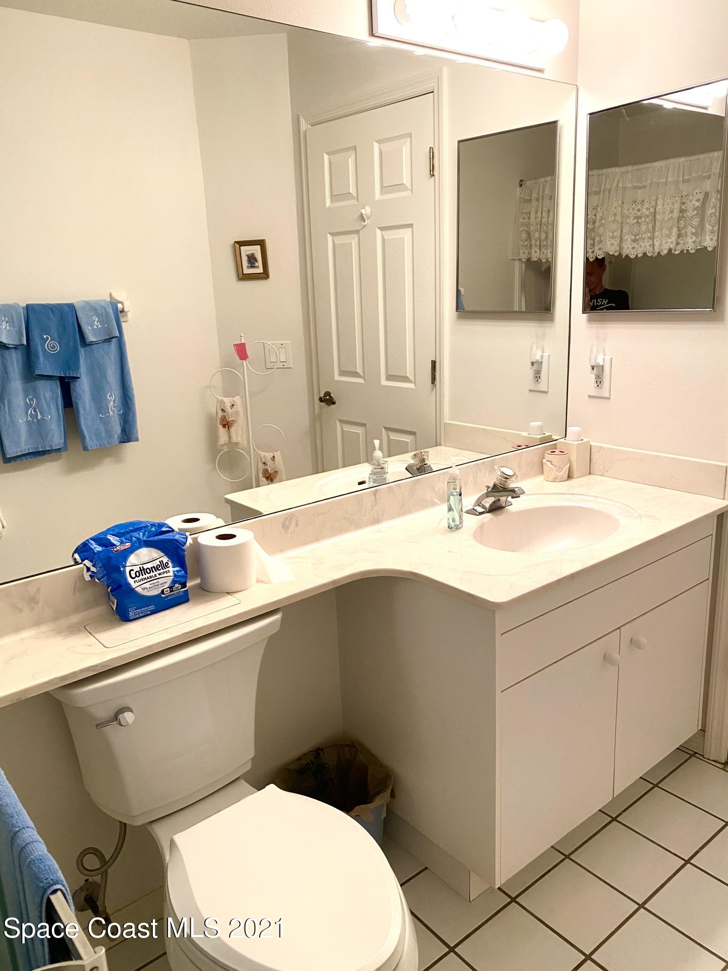 1210 Meadowbrook Road Northeast Palm Bay, FL 32905 - Photo 28 of 36 Guest bathroom