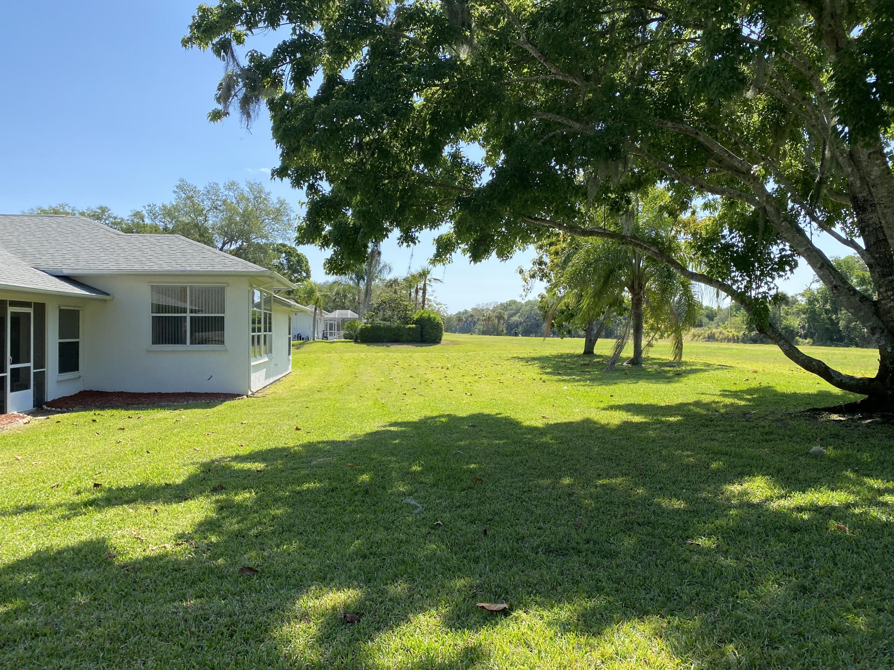 1210 Meadowbrook Road Northeast Palm Bay, FL 32905 - Photo 5 of 36 Side yard