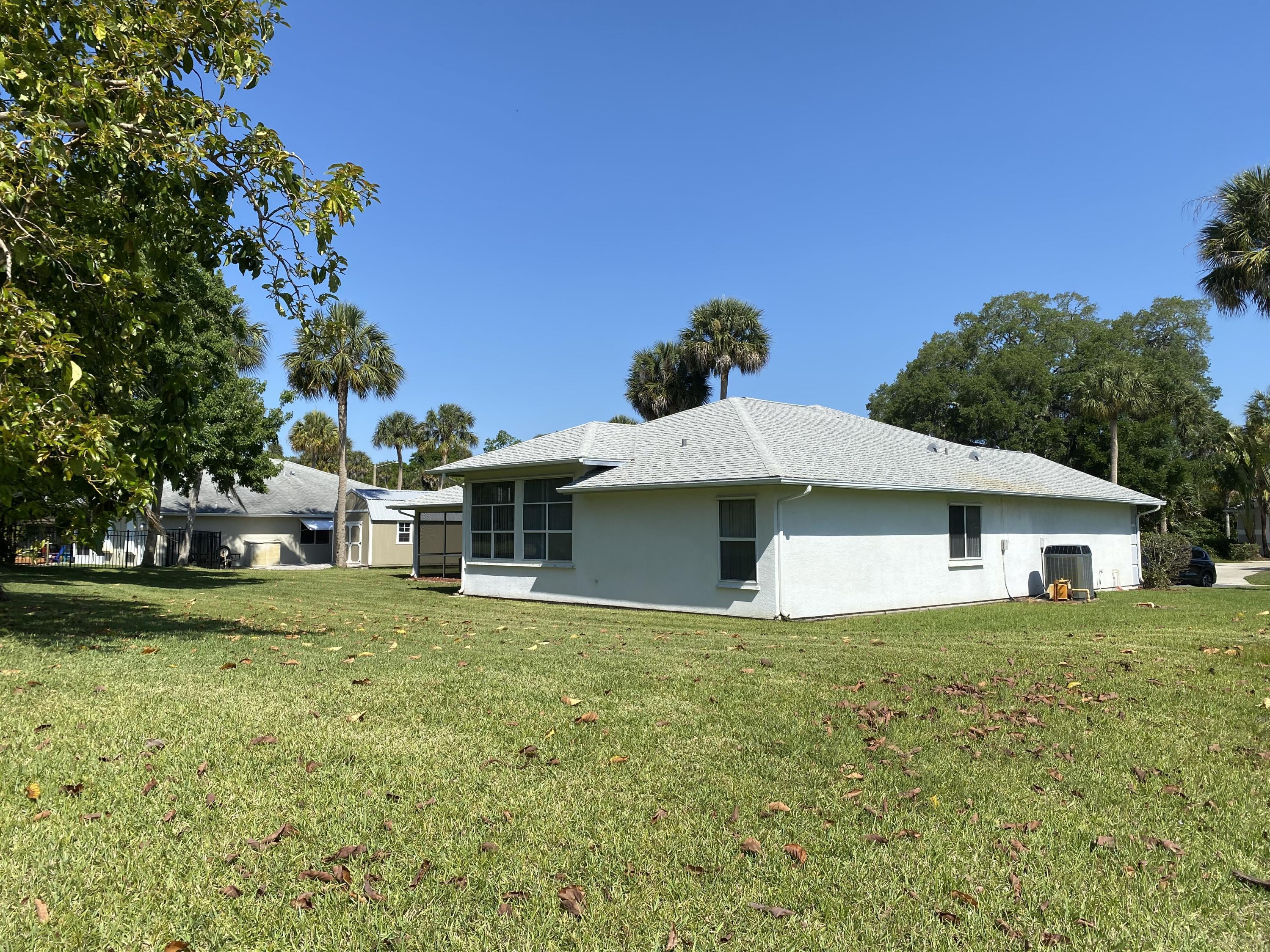 1210 Meadowbrook Road Northeast Palm Bay, FL 32905 - Photo 9 of 36 Back yard