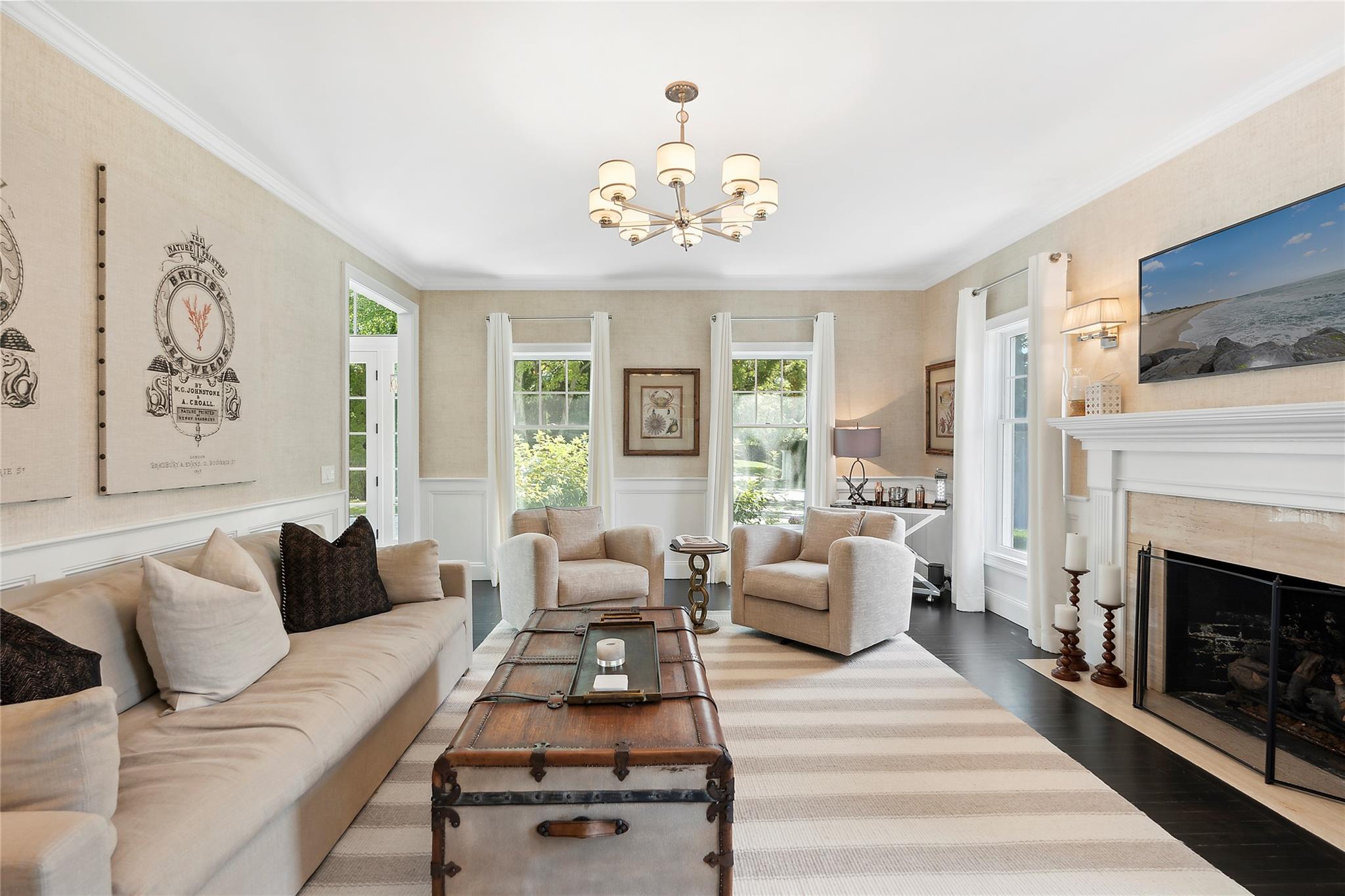 146 Coopers Farm Road Southampton, NY 11968 - Photo 4 of 25 a living room with furniture fireplace and flat screen tv