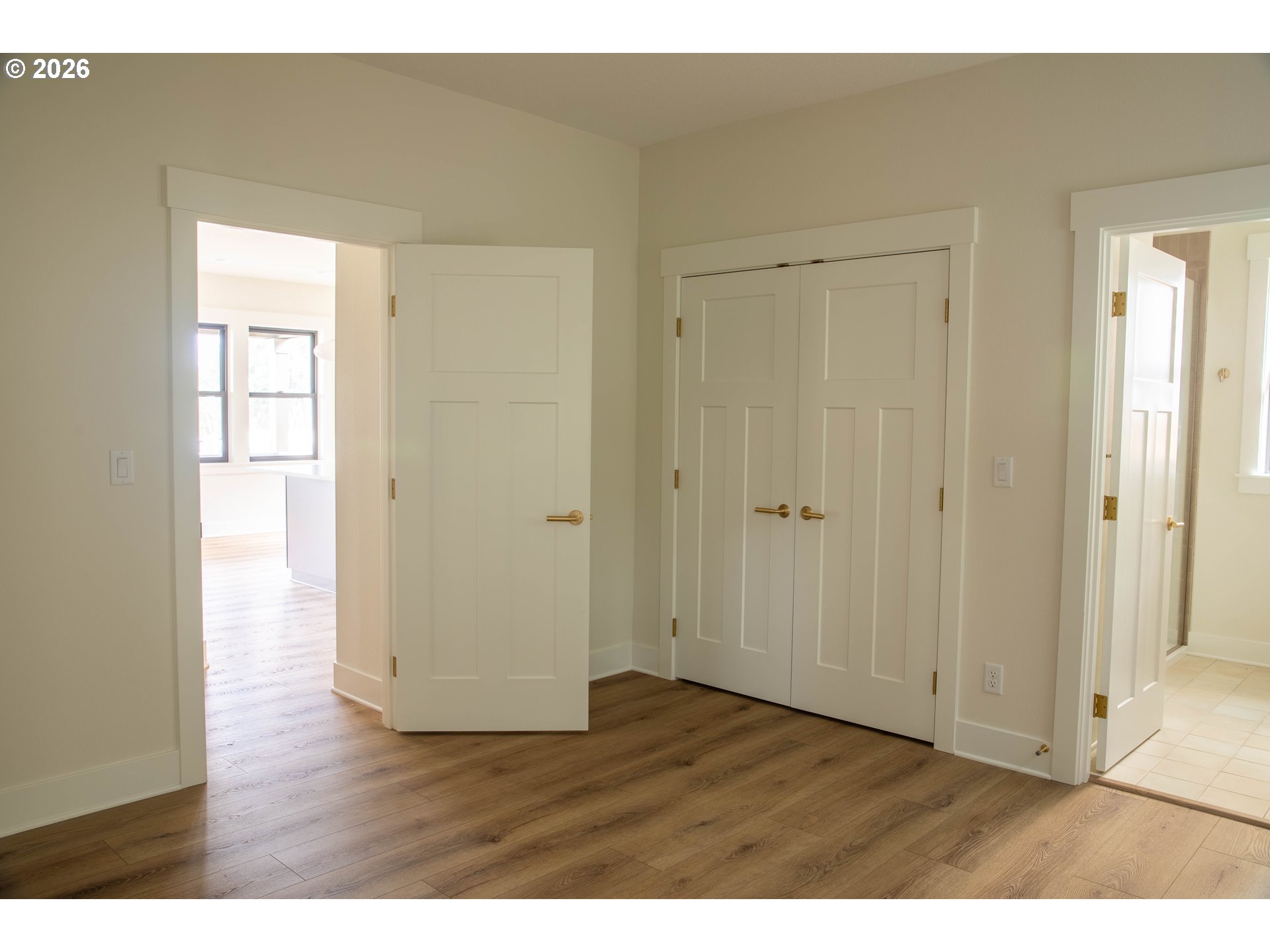 1710 Strong Road Southeast Salem, OR 97302 - Photo 11 of 18 a view of an empty room with wooden floor