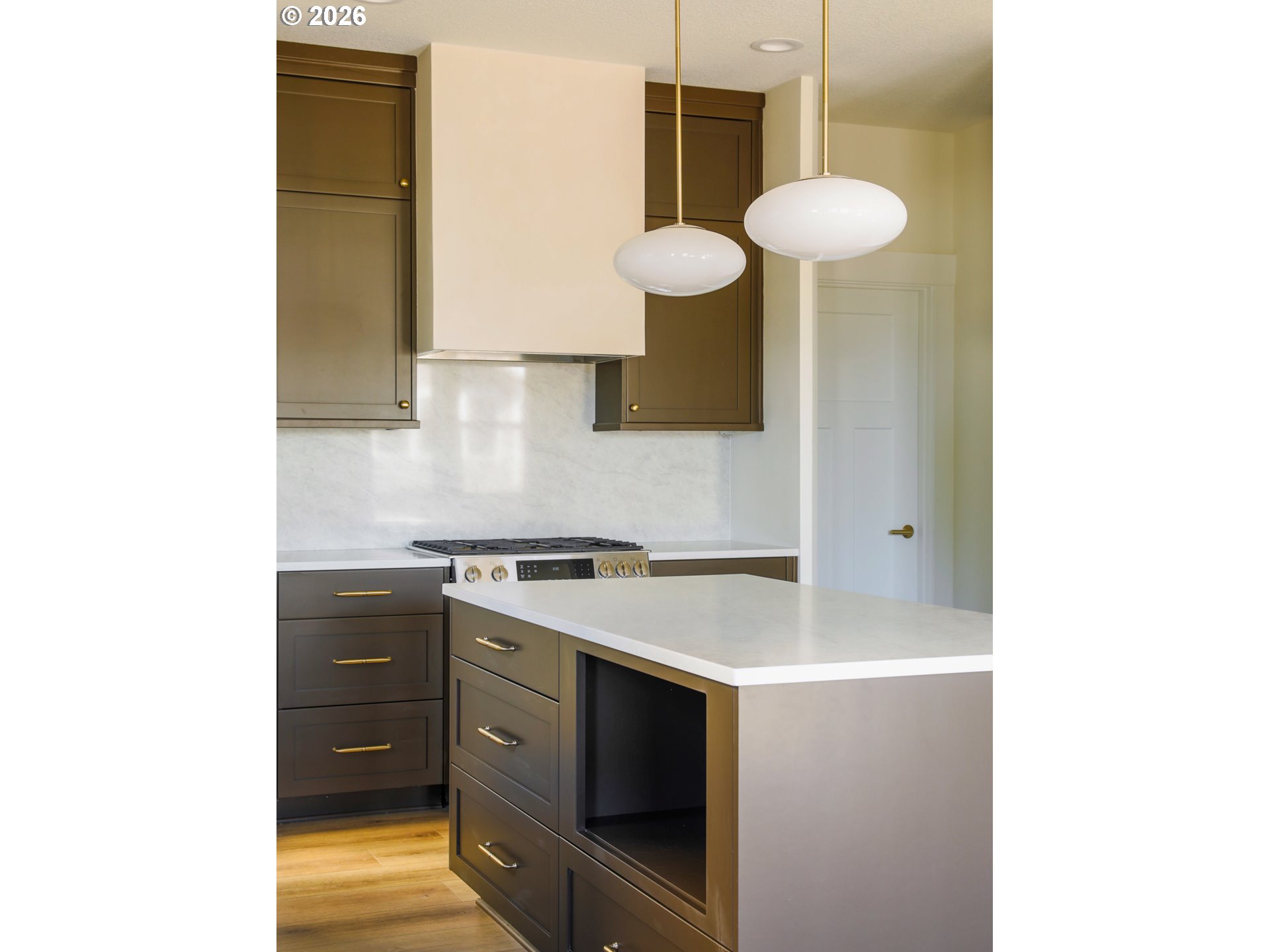 1710 Strong Road Southeast Salem, OR 97302 - Photo 8 of 18 a kitchen with a sink cabinets and a stove
