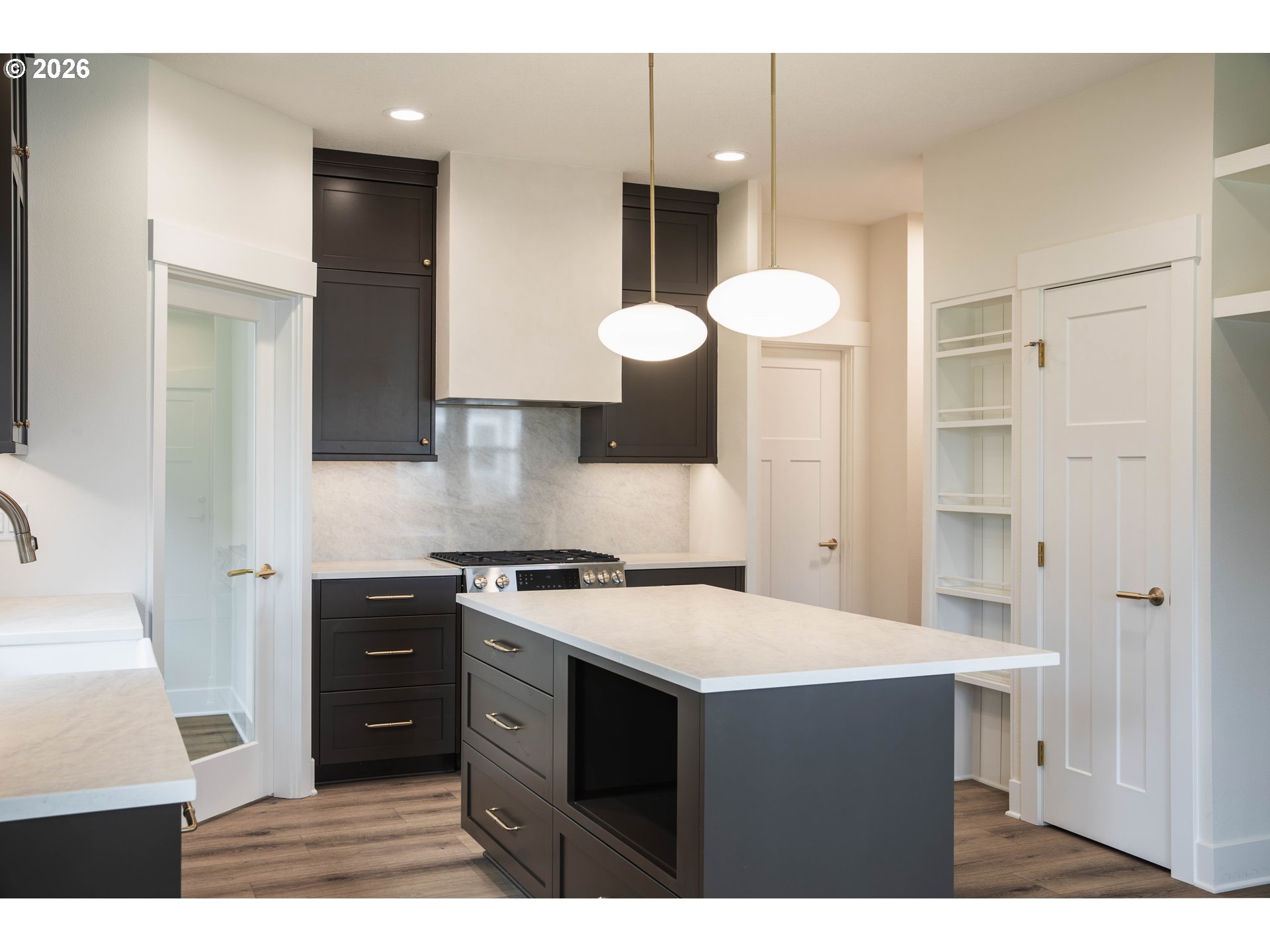 1710 Strong Road Southeast Salem, OR 97302 - Photo 9 of 18 a kitchen with a sink and a stove