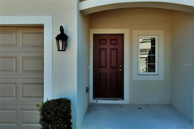 an aerial view of a house with a garden