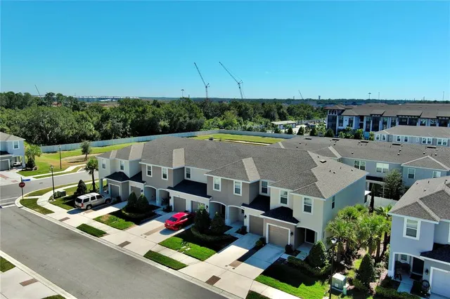 an aerial view of a house with a garden
