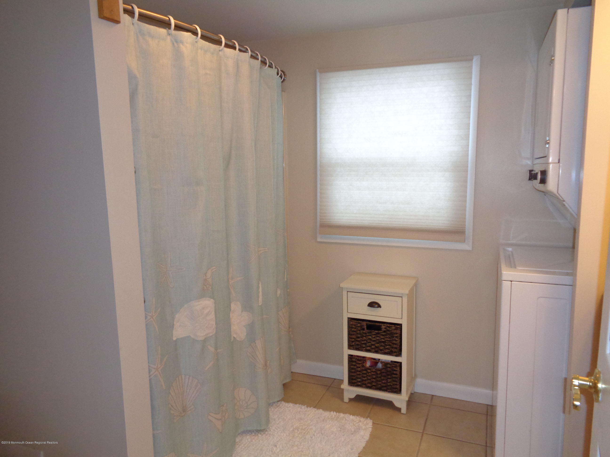 20 Capstan Road Waretown, NJ 08758 - Photo 17 of 25 a view of an empty room with a window