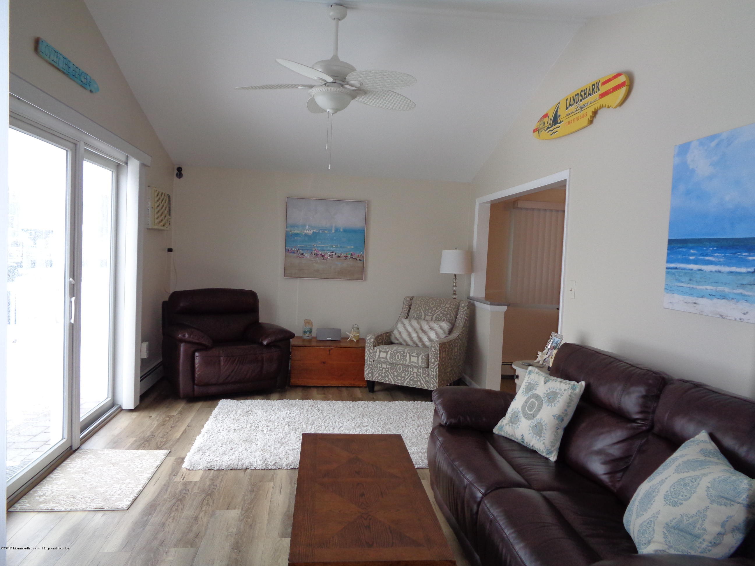 20 Capstan Road Waretown, NJ 08758 - Photo 6 of 25 a living room with furniture and a window