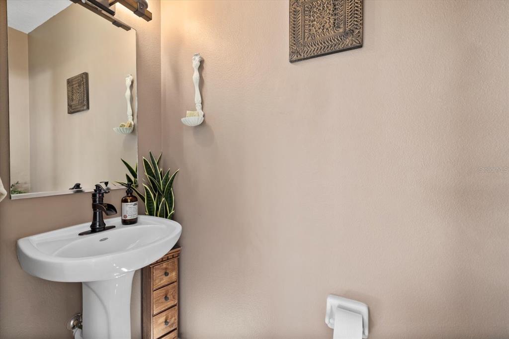 14932 Amberjack Terrace Lakewood Ranch, FL 34202 - Photo 11 of 45 a bathroom with a sink and mirror