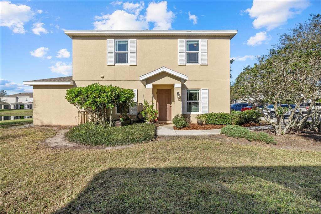 14932 Amberjack Terrace Lakewood Ranch, FL 34202 - Photo 27 of 45 a front view of a house with garden