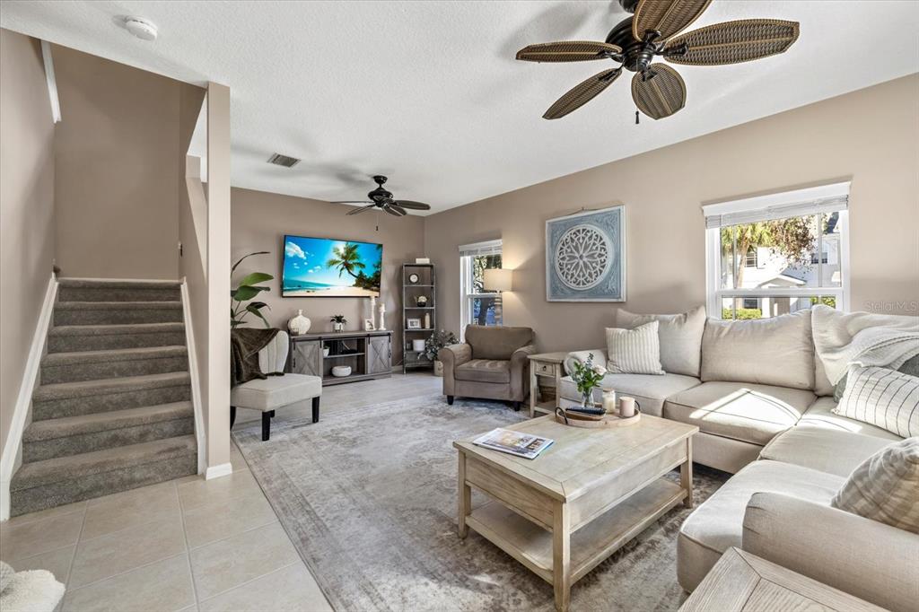 14932 Amberjack Terrace Lakewood Ranch, FL 34202 - Photo 5 of 45 a living room with furniture and wooden floor