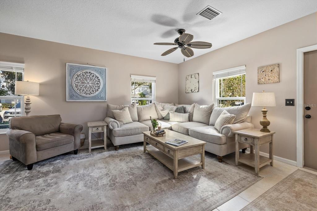 14932 Amberjack Terrace Lakewood Ranch, FL 34202 - Photo 6 of 45 a living room with furniture and a large window