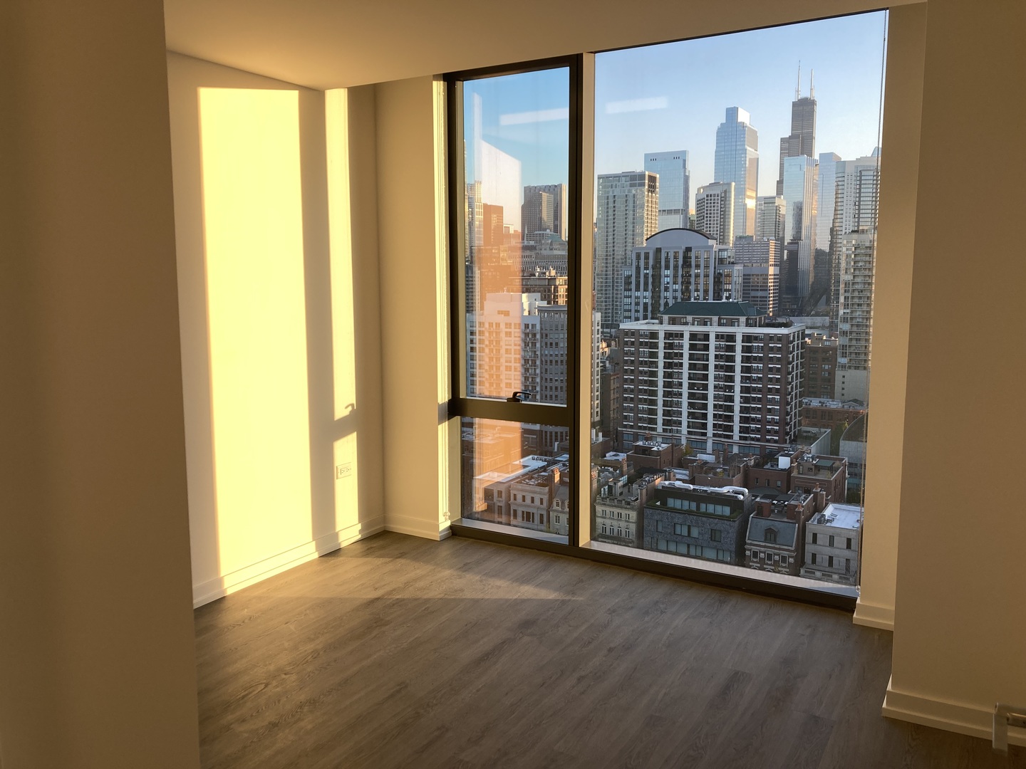 808 North Cleveland Avenue, Unit 1606 Chicago, IL 60610 - Photo 10 of 11 a view of a room with floor to ceiling window