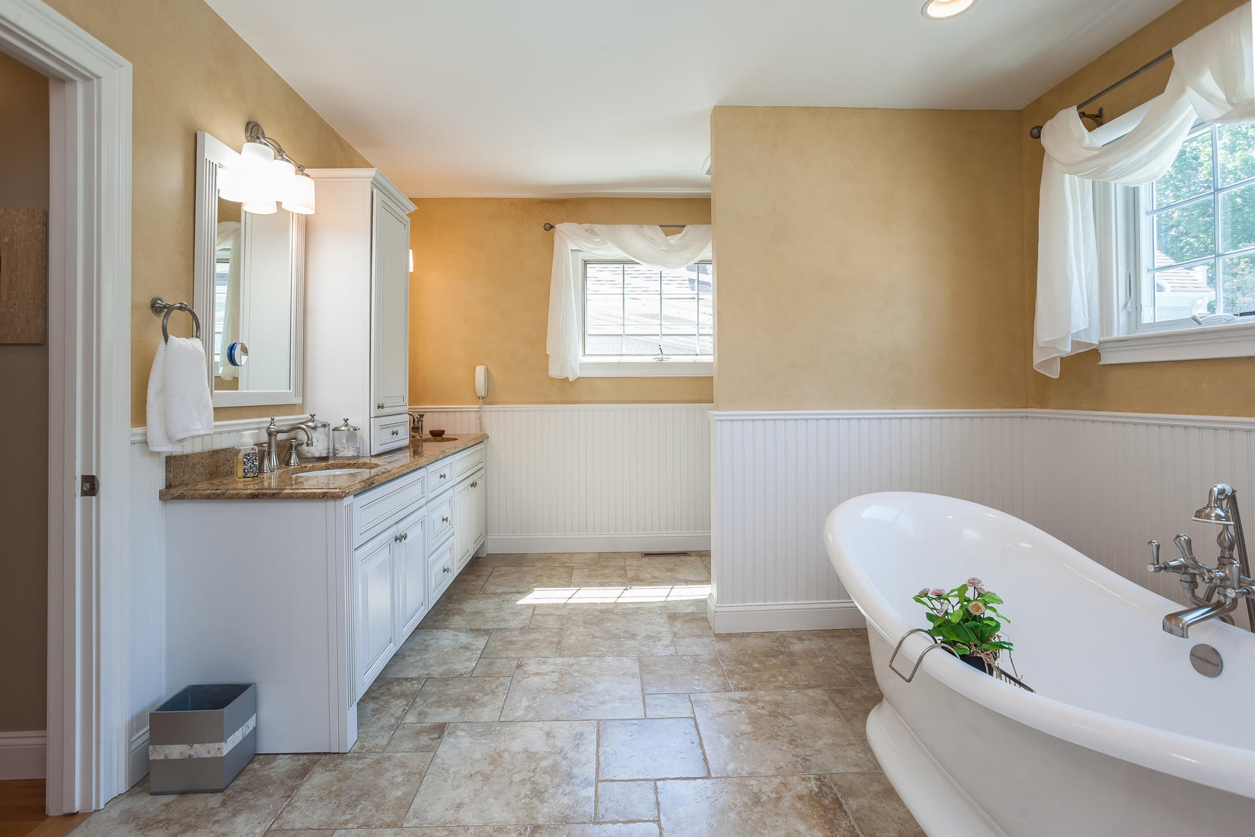 31 Torrey Road East Sandwich, MA 02537 - Photo 15 of 35 a spacious bathroom with a tub sink and mirror