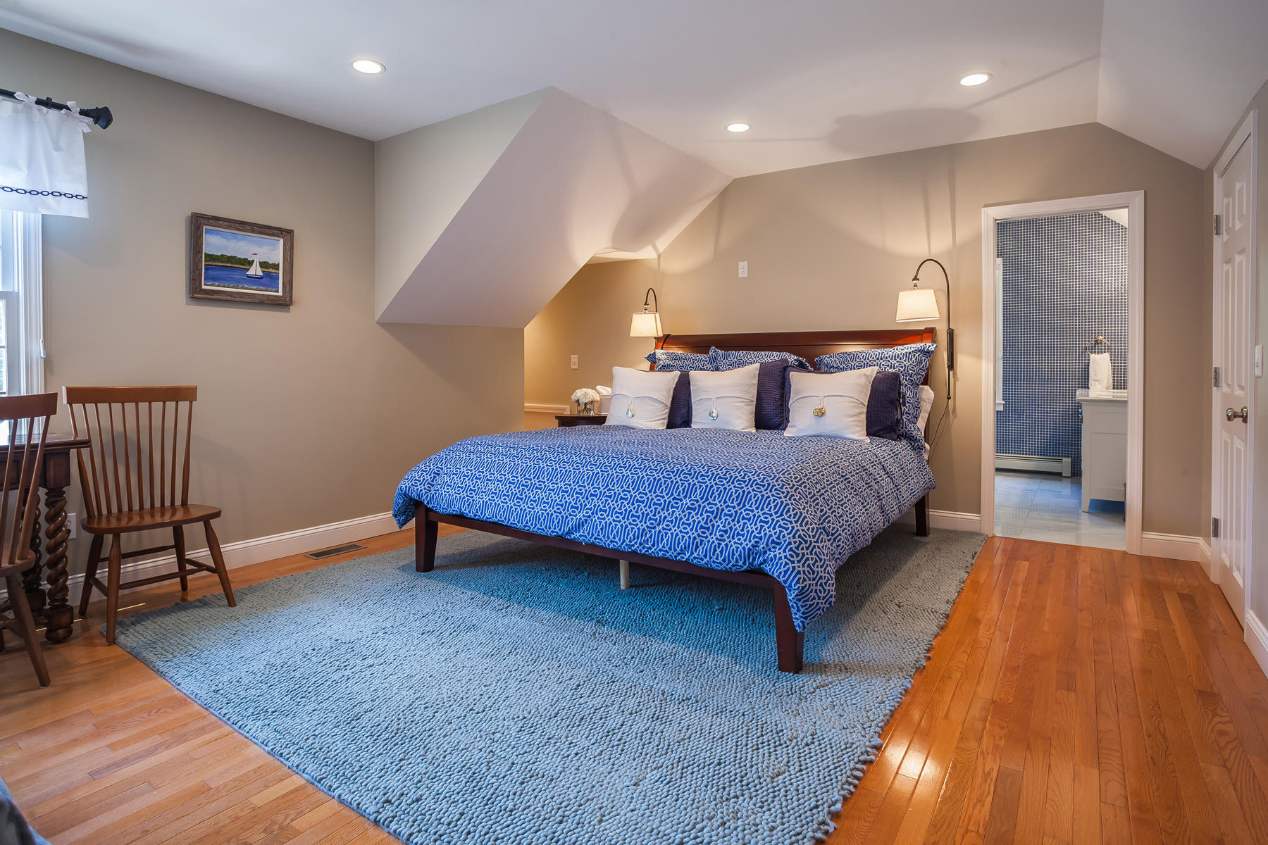 31 Torrey Road East Sandwich, MA 02537 - Photo 21 of 35 a spacious bedroom with a bed and a table in it