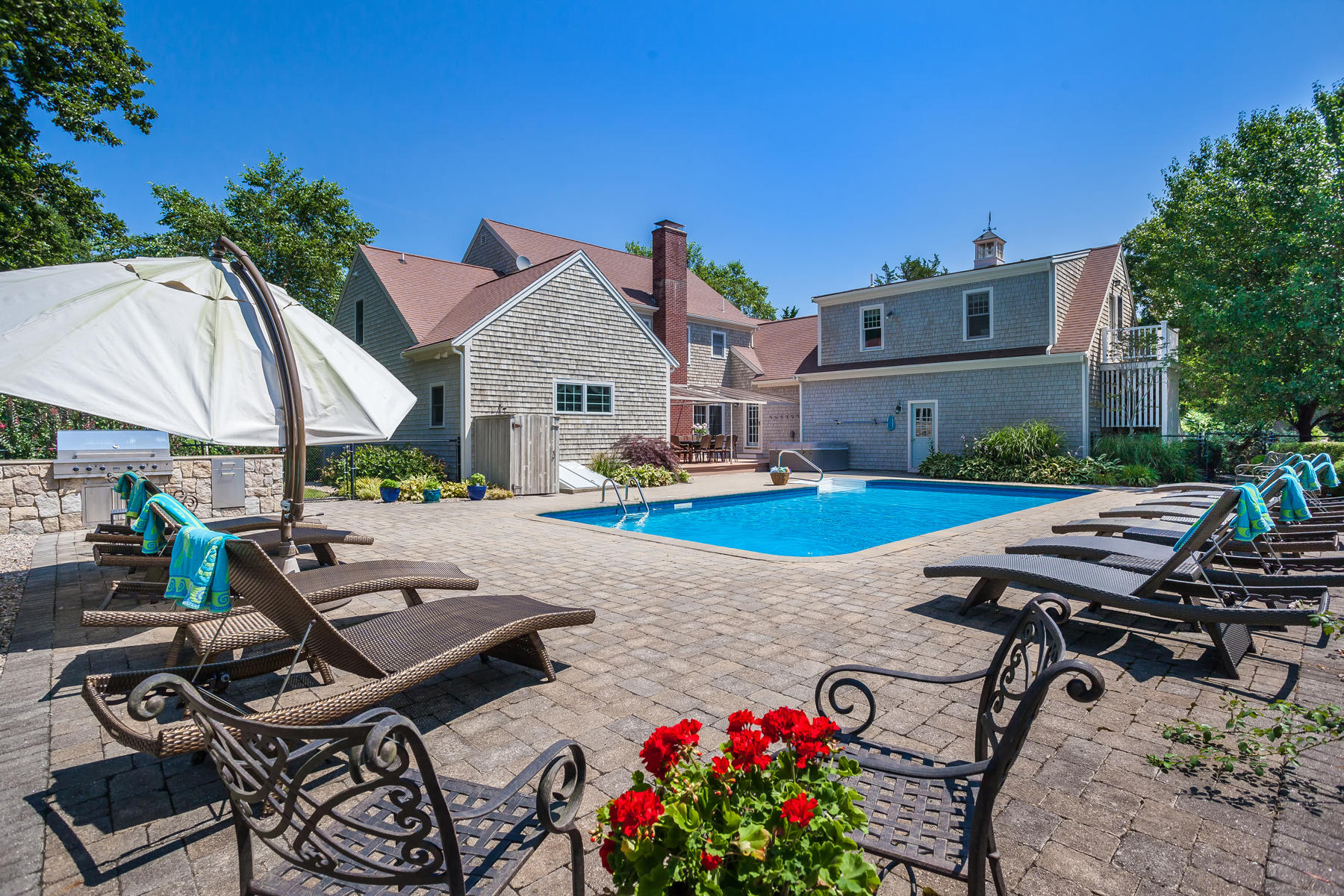 31 Torrey Road East Sandwich, MA 02537 - Photo 29 of 35 a view of backyard with outdoor seating a patio and a garden