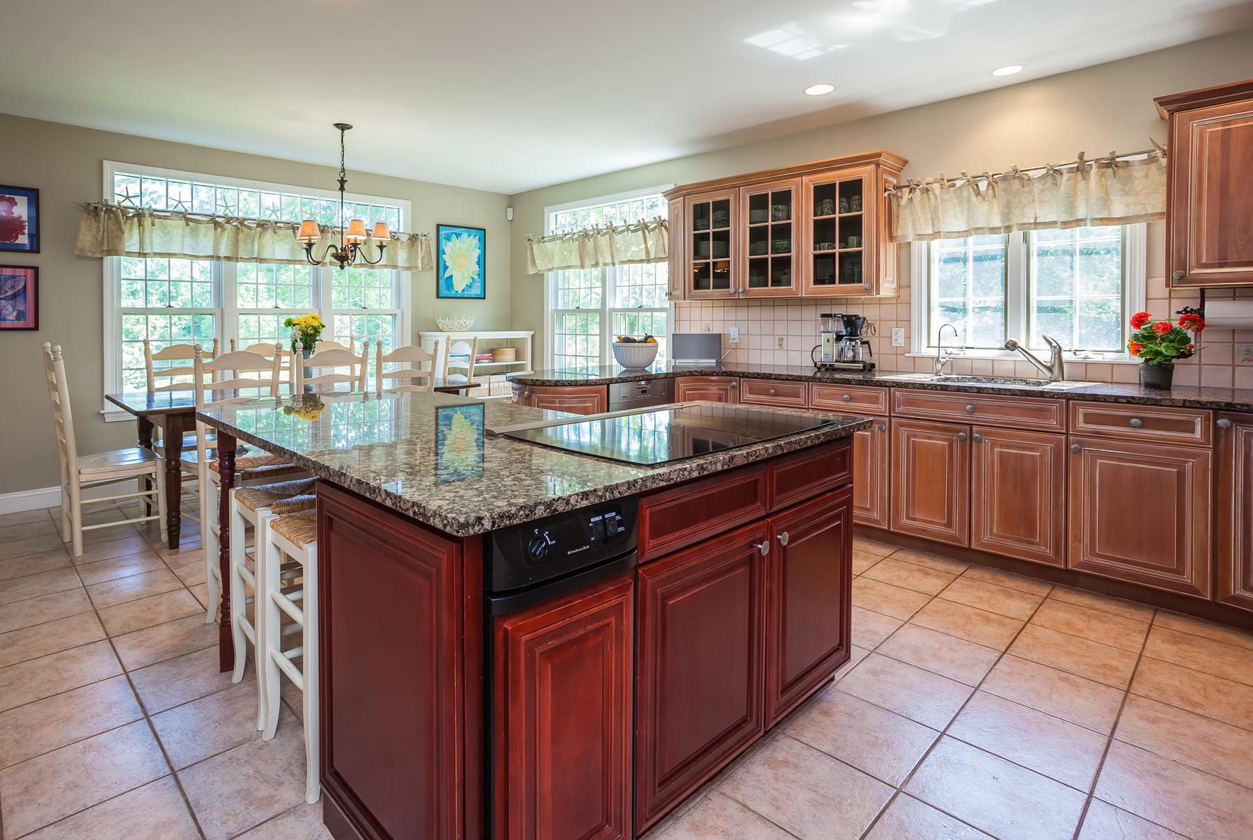 31 Torrey Road East Sandwich, MA 02537 - Photo 9 of 35 a kitchen with granite countertop sink stove and cabinets