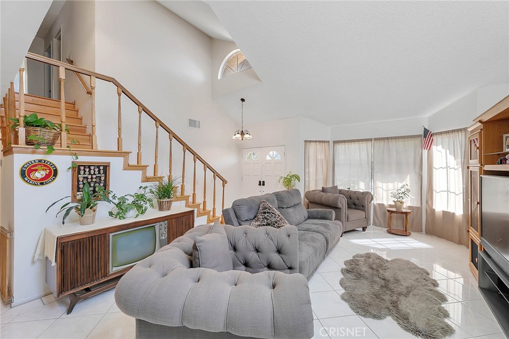 545 Lorabel Way, Unit D Simi Valley, CA 93065 - Photo 11 of 34 a living room with furniture and a table