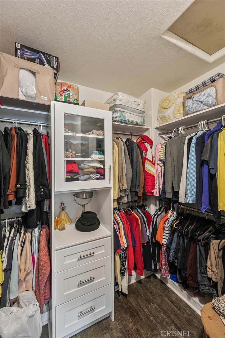545 Lorabel Way, Unit D Simi Valley, CA 93065 - Photo 26 of 34 a view of walk in closet with clothes