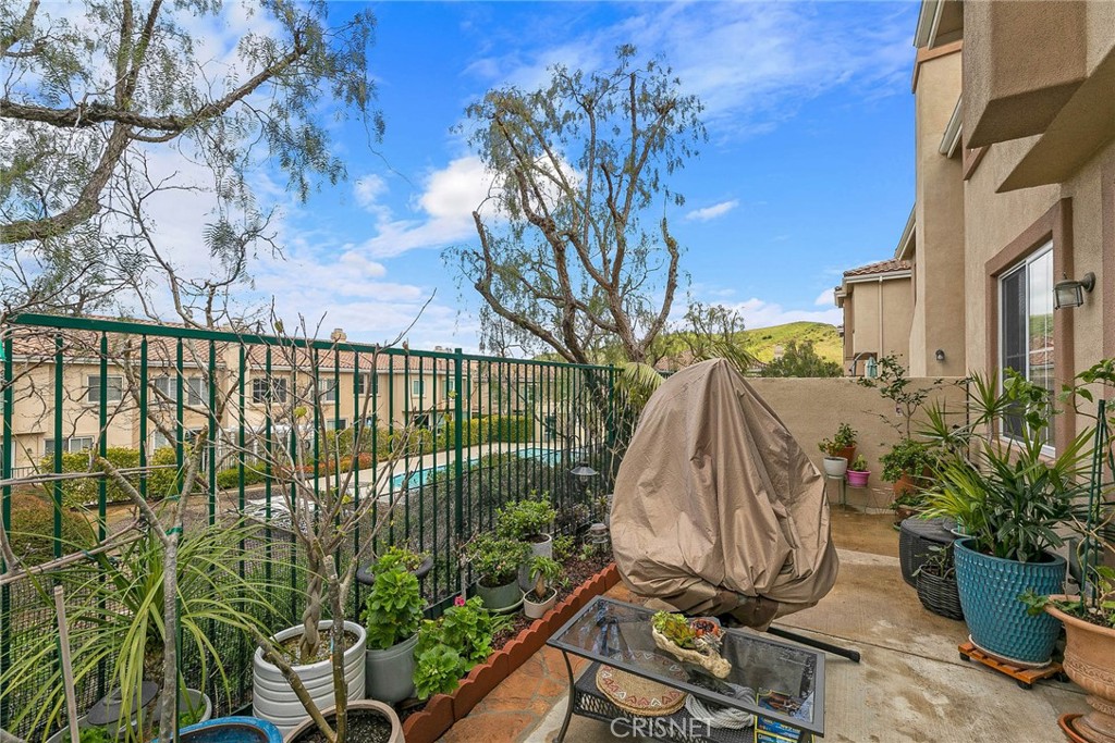 545 Lorabel Way, Unit D Simi Valley, CA 93065 - Photo 32 of 34 a view of a backyard