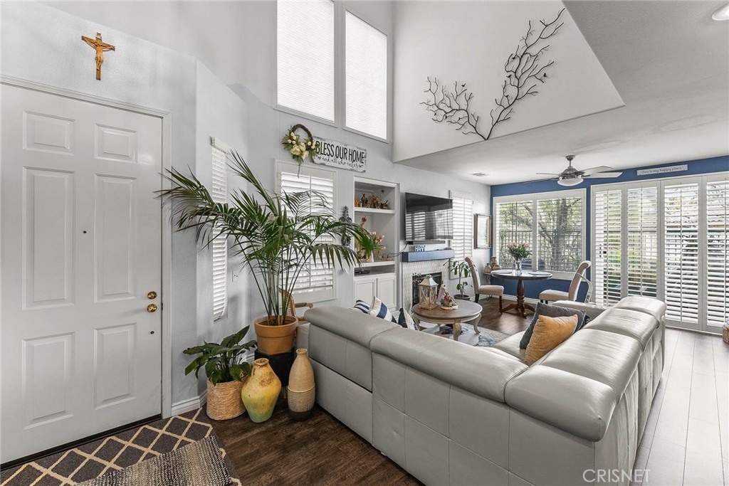 545 Lorabel Way, Unit D Simi Valley, CA 93065 - Photo 8 of 34 a living room with furniture and a large window