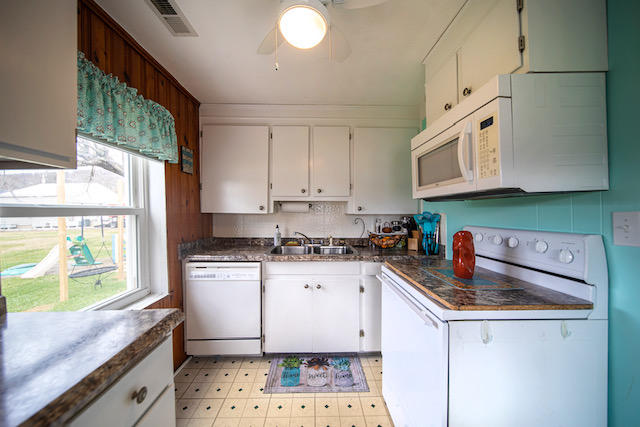 415 Turner Road Salem, VA 24153 - Photo 2 of 27 a kitchen with stainless steel appliances granite countertop a sink stove and refrigerator