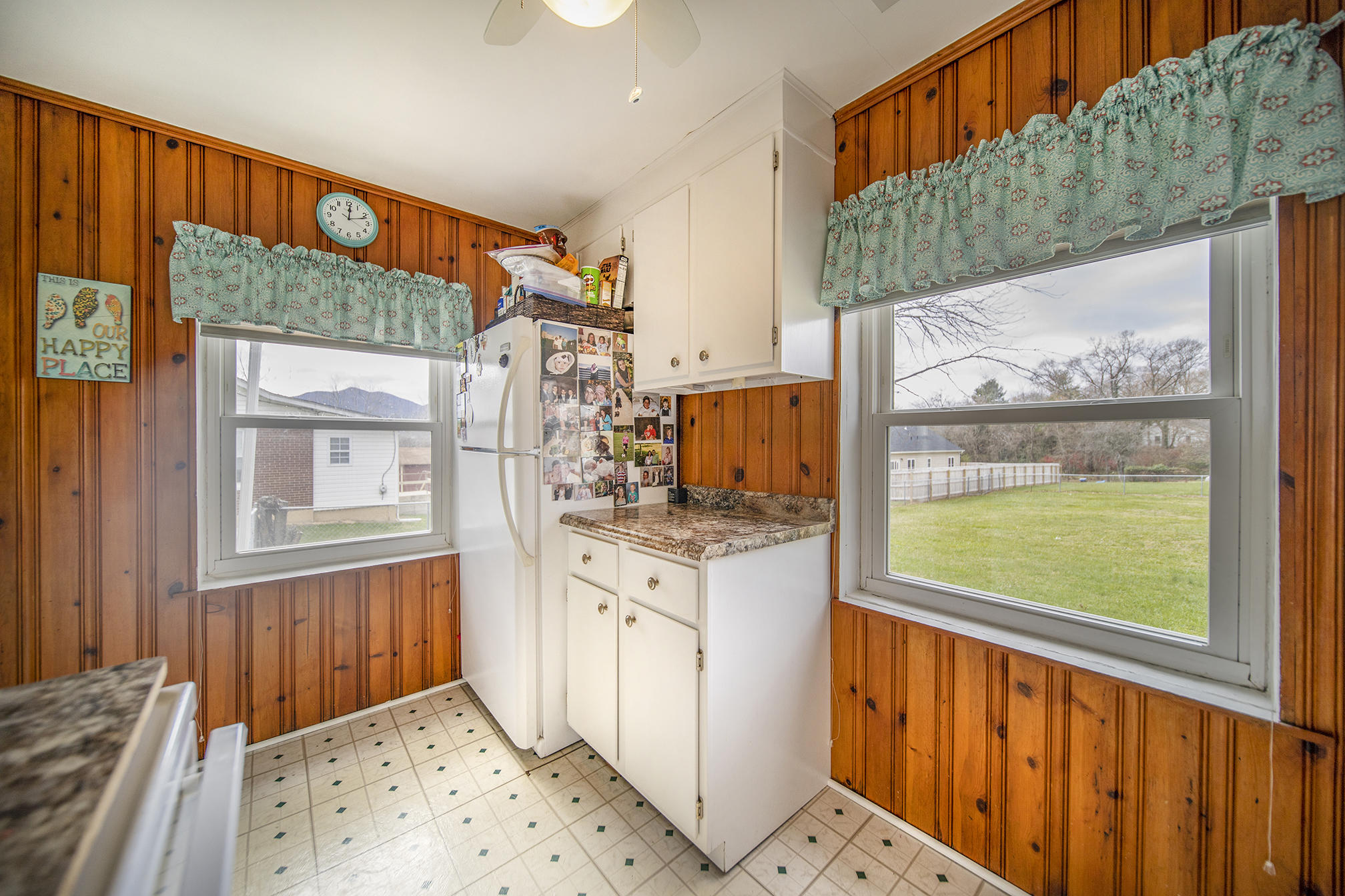 415 Turner Road Salem, VA 24153 - Photo 12 of 27 a view of a kitchen with wooden floor and windows