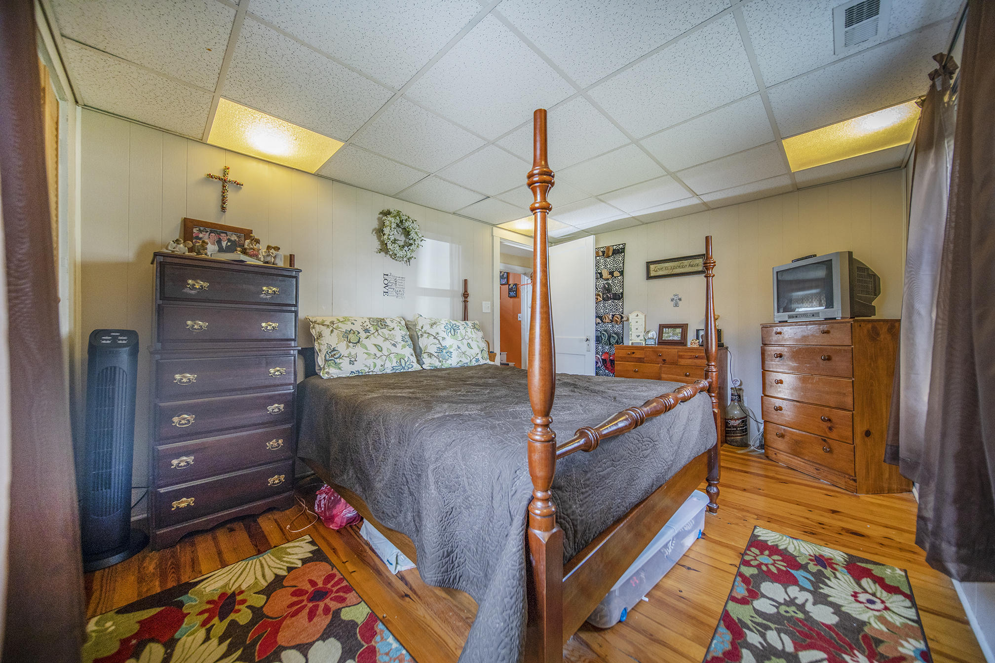415 Turner Road Salem, VA 24153 - Photo 14 of 27 a bed room with a bed and a dresser