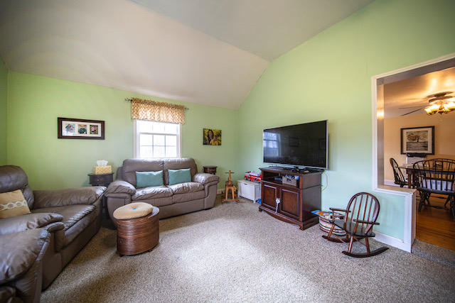 415 Turner Road Salem, VA 24153 - Photo 3 of 27 a living room with furniture and a flat screen tv