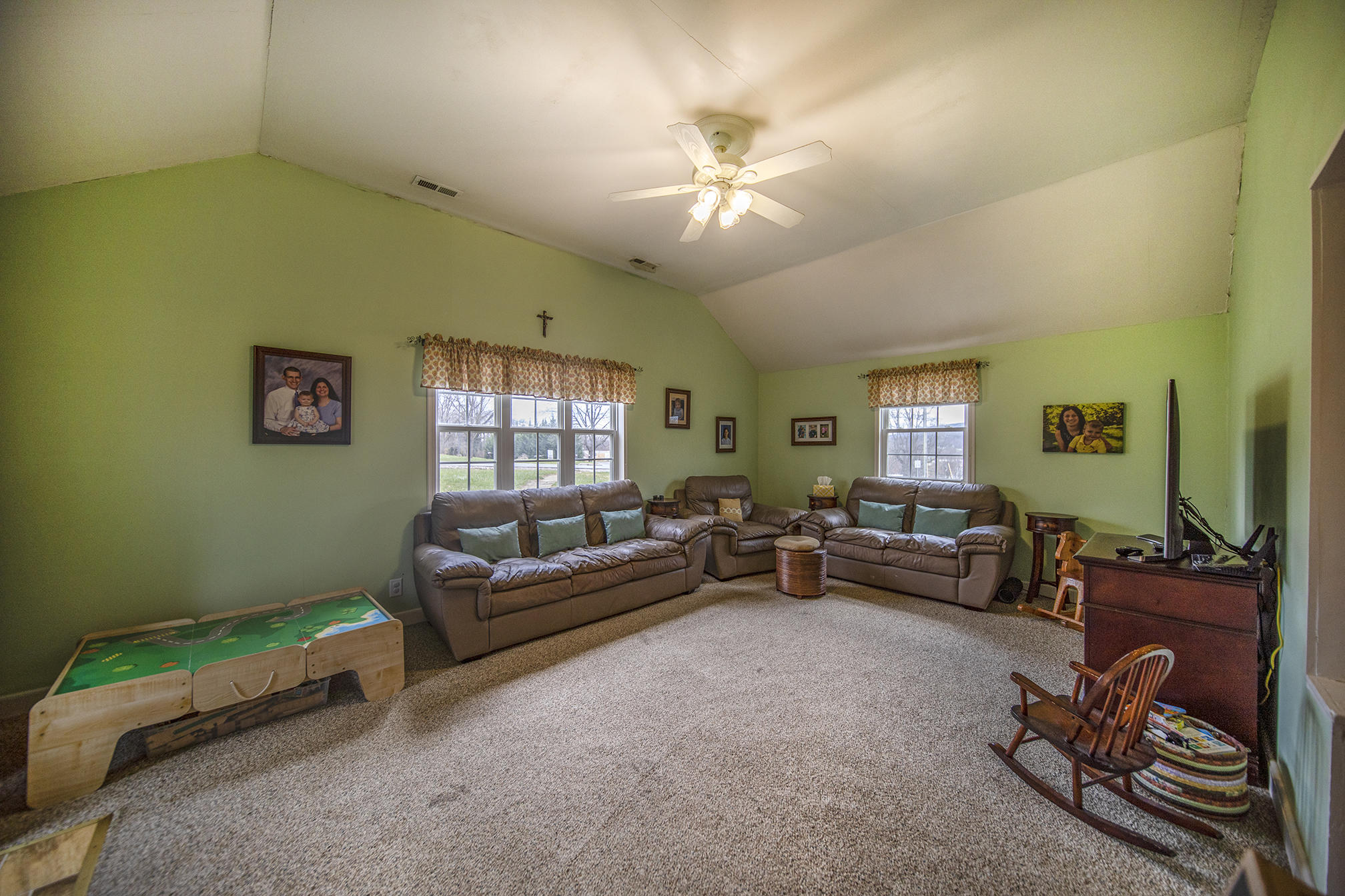 415 Turner Road Salem, VA 24153 - Photo 4 of 27 a living room with furniture and a window