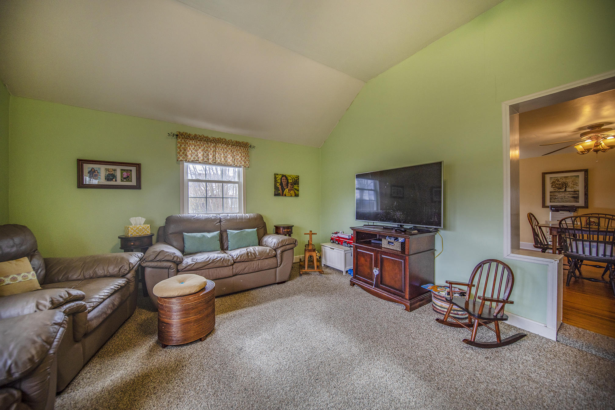 415 Turner Road Salem, VA 24153 - Photo 6 of 27 a living room with furniture and a flat screen tv
