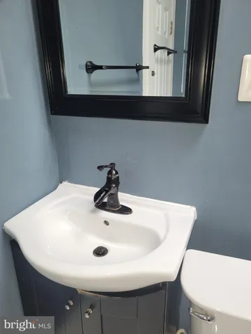 a bathroom with a sink and a toilet