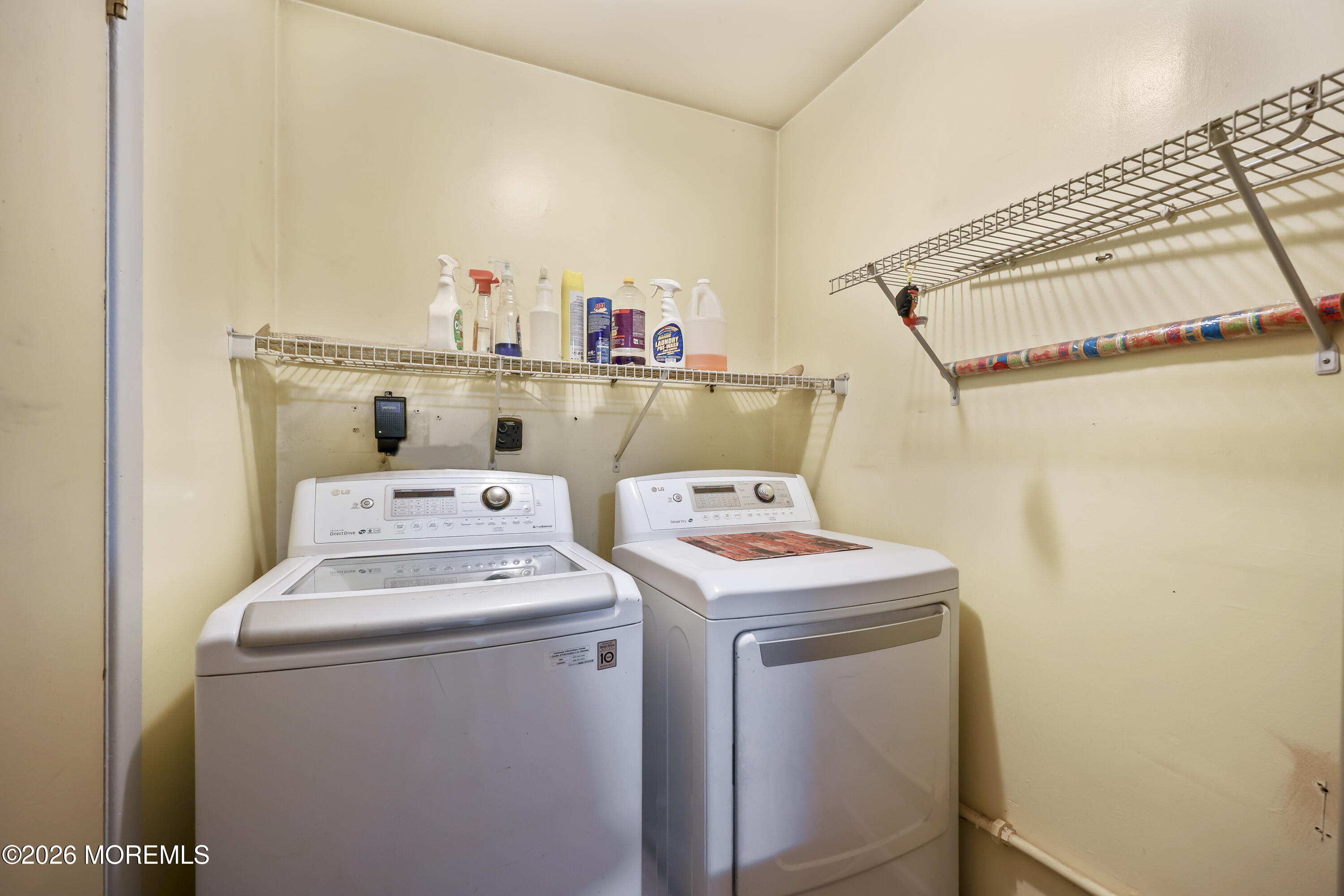 287 Church Street Aberdeen, NJ 07747 - Photo 11 of 15 a utility room with dryer and washer